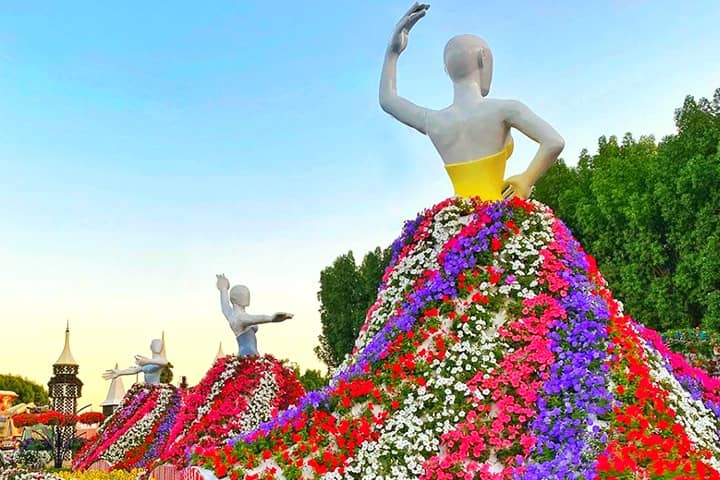 Ballet Dancers at Dubai Miracle Garden are mannequins that are wearing floral frocks and rotating.