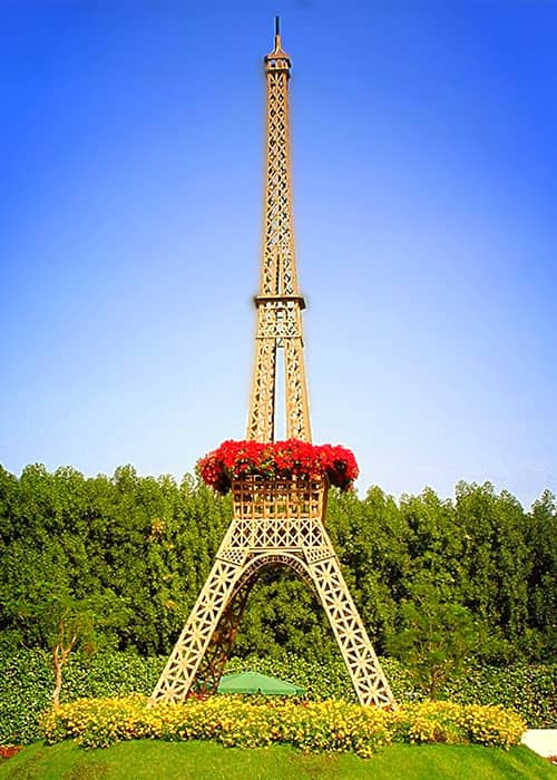 Eiffel Tower at the Dubai Miracle Garden is decorated with Petunia and Marigold flowers.