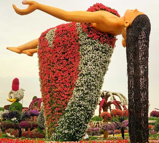 The Aerial Floating Lady resembles like a doll at the Dubai Miracle Garden.