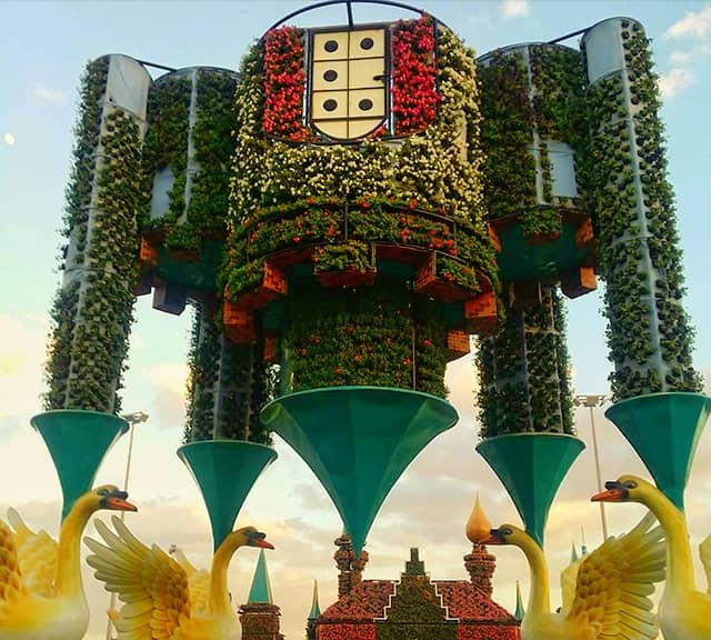Petunia and Verbena flowers are decorated at the Inverted Castle of Dubai Miracle Garden.