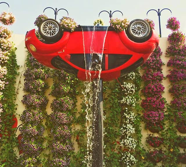 Petunia flowers used to decorate Inverted Volkswagen Car at the Dubai Miracle Garden.