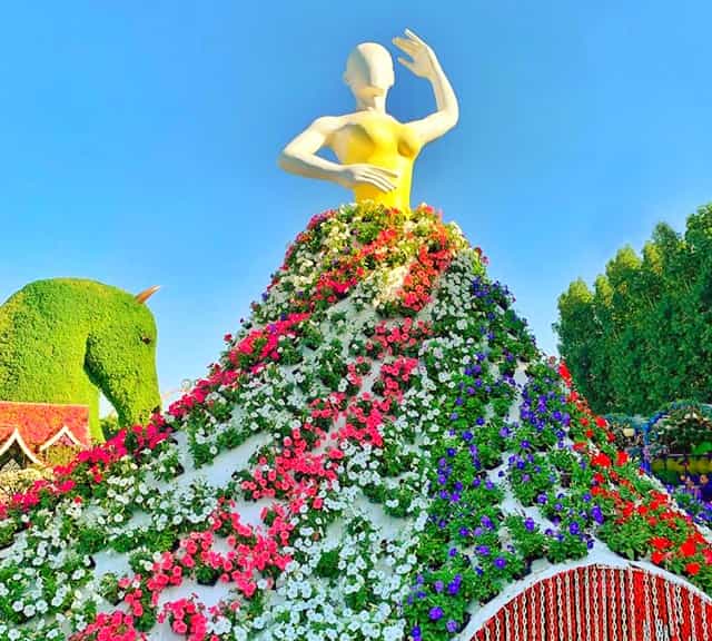 Ballet Danceres are 15 feet tall at the Dubai Miracle Garden.