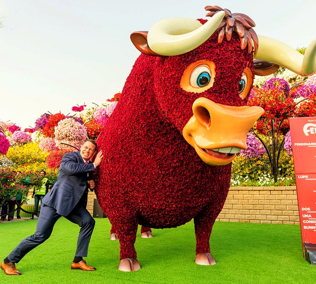 John Cena moving Ferdinand the Bull.